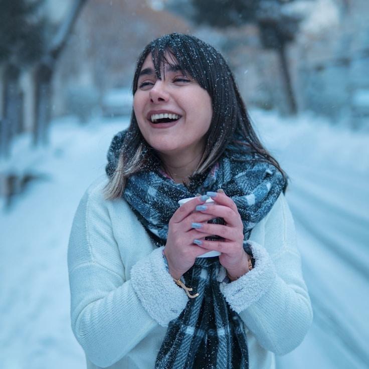 Kaveri Mehta, Lead Design Curator at BreezeValleyFusion, reviewing corporate floral arrangements